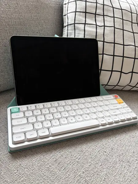 NuPhy Air V3 65 on folio cover with an iPad on the tent