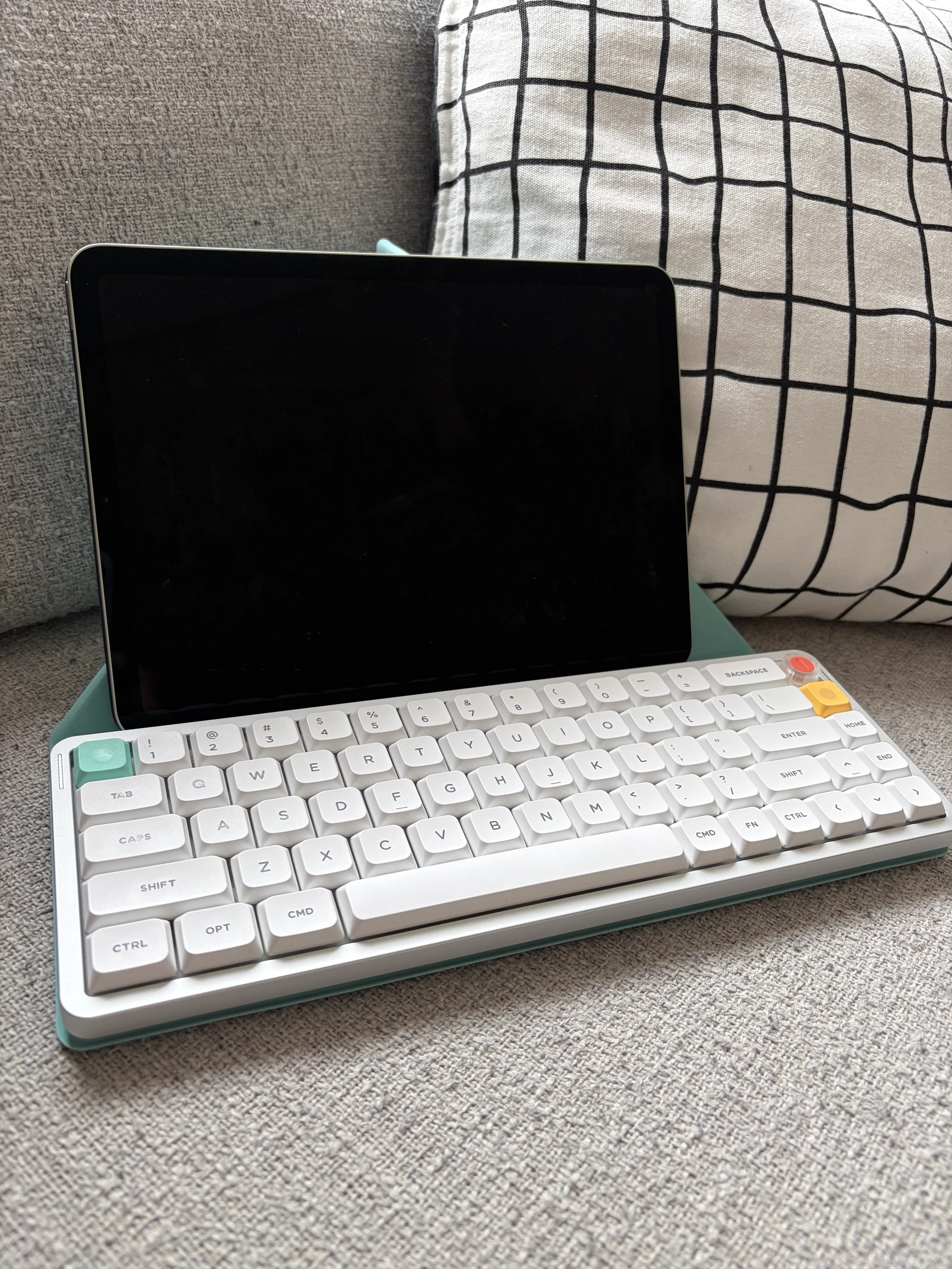 NuPhy Air V3 65 on folio cover with an iPad on the tent